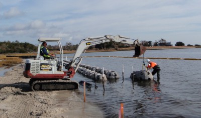 Contractors start building an oyster reef in Stump Sound in Onslow County.