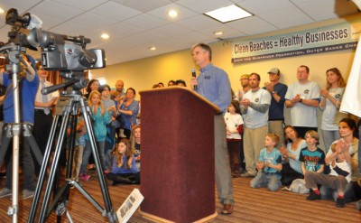 Lee Nettles, executive director of the Outer Banks Visitors Bureau, speaks at the rally about the risks offshore drilling pose to the tourism industry. Photo: Catherine Kozak