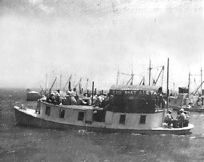 Loaded to the gunnels, the Aleta starts the four-hour journey across Pamlico Sound. Photo: Ocracoke Preservation Society