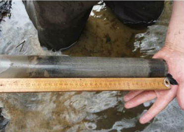 Core samples of the stream bed in the upper portions of Hawkins Creek found that inorganic sand made up more than 75 percent of the samples, an indication of stormwater runoff. Photo: N.C. Division of Water Resources