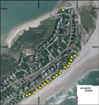 Homes on FIgure Eight Island currently protected by sandbags and considered in danger of being lost to erosion are indicated in yellow in this image from the supplemental environmental study. Photo: Army Corps of Engineers