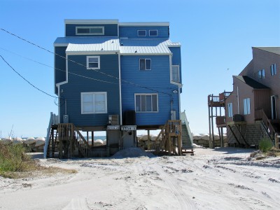 A North Topsail Beach oceanfront homesite shows the evidence of overwash that breached the dunes during the coastal storm earlier this month. Photo: Mark Hibbs