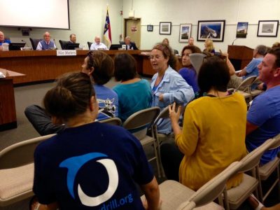 Members of the environmental group Oceana attend the meeting in Emerald Isle Tuesday. Photo: Oceana N.C.