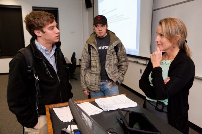 Susan Wilde, a professor at the University of Georgia, talks to her students after class. Photo: University of Georgia.