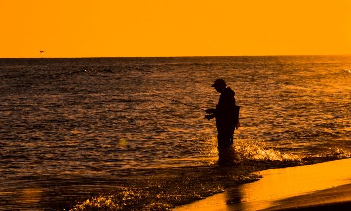 A fisher takes advantage of the last few moments of daylight. Photo: Jody Merritt