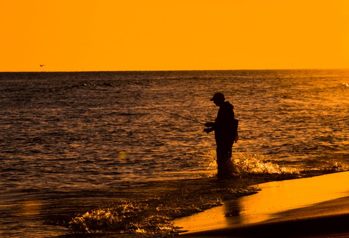 A fisher takes advantage of the last few moments of daylight. Photo: Jody Merritt