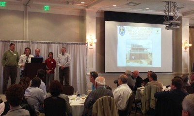 N.C. Coastal Federation staff, Ted Wilgis, left, Tracy Skrabal, Mike Giles and Karen Dunn and federation advisory committee member Larry Sneeden accept the award Thursday in Wilmington. Photo: contributed