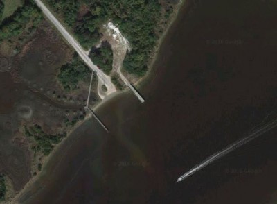 The N.C. Coastal Federation’s site at Morris Landing on Stump Sound in Holly Ridge includes a public pier, left, and another pier used for loading oyster shells for restoration work. Photo: Google Earth
