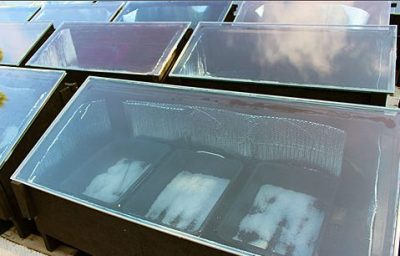 Panel closeup: Salt is shown in one of the ovens. Photo: Hannah Barnett