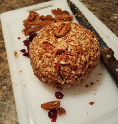 Port wine-soaked cherries or cranberries are folded into the soft cheese mixture, which is then rolled into a ball and covered in chopped pecans. Photo: Liz Biro