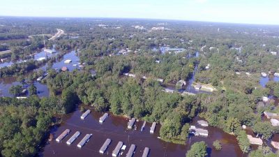 Congress secured $300 million in federal aid to assist with Hurricane Matthew recovery. Flooding, such as this scene in Princeville, led to $1.5 billion in damages, state officials said. Photo: Department of Public Safety 