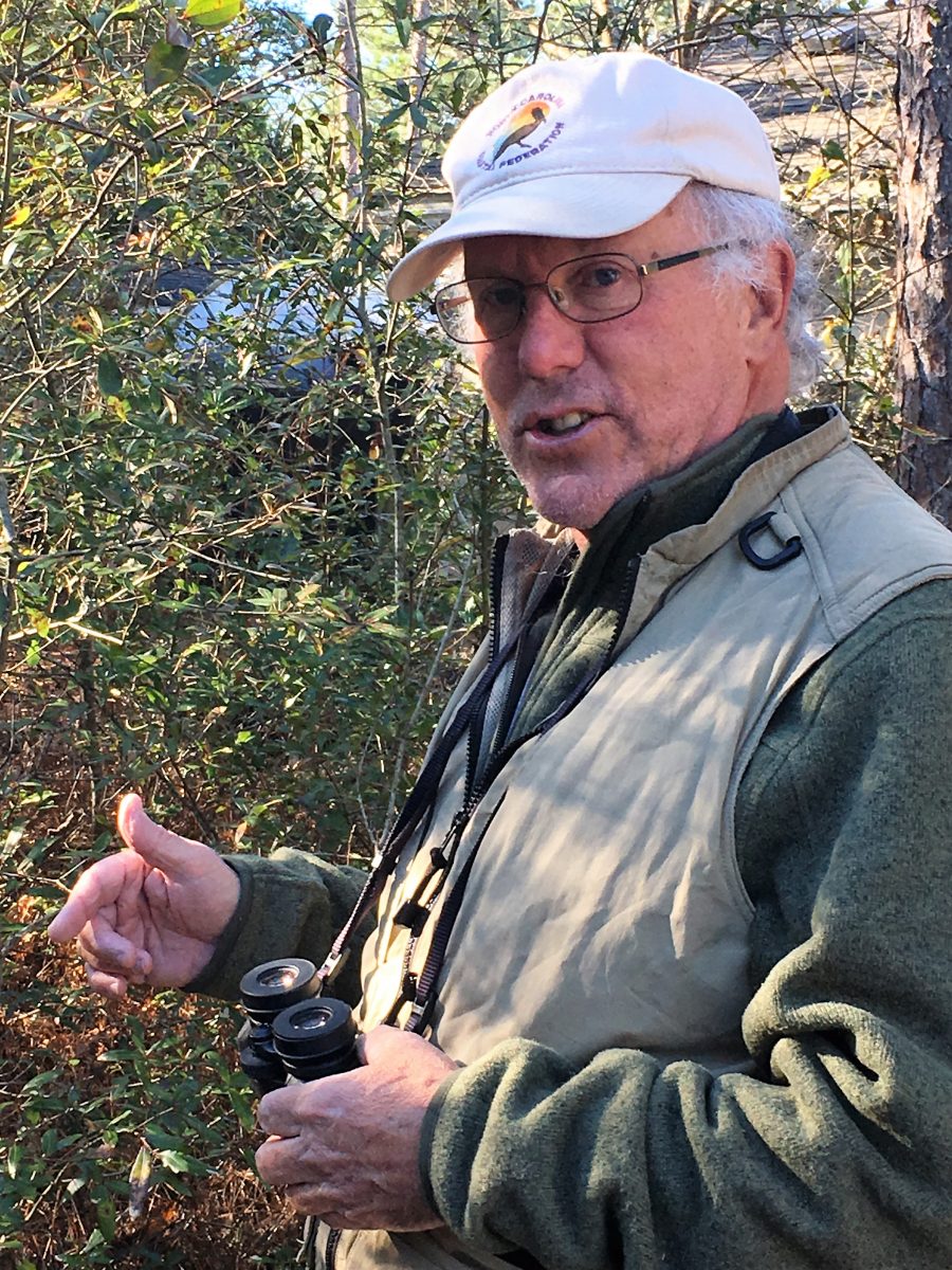 John Fussell discusses his interest in birding in this 2017 photo for Coastal Review by Brad Rich.