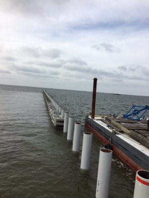 The water is calm to the left of the wave-break structure from this perspective. Photo: North Carolina Department of Transportation 