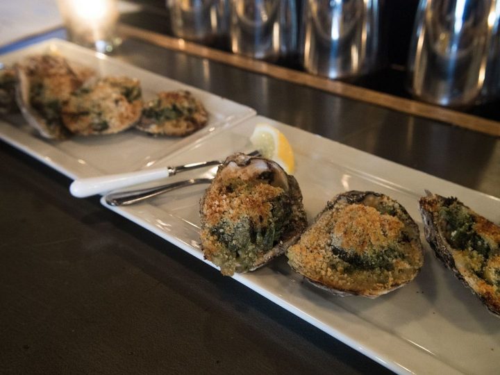 https://coastalreview.org/wp-content/uploads/2018/01/Oysters_Rockefeller_at_a_restaurant-e1517424863121.jpg