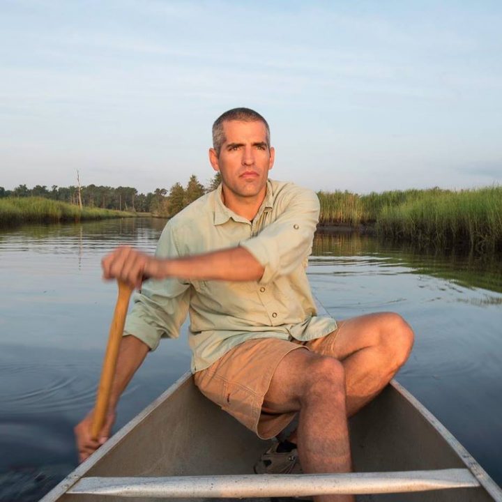 Kemp Burdette, riverkeeper at Cape Fear River Watch, is shown paddling. File photo 