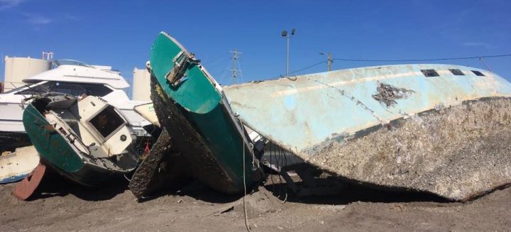 Anyone know what type of boat this is? Derelict and tied up near