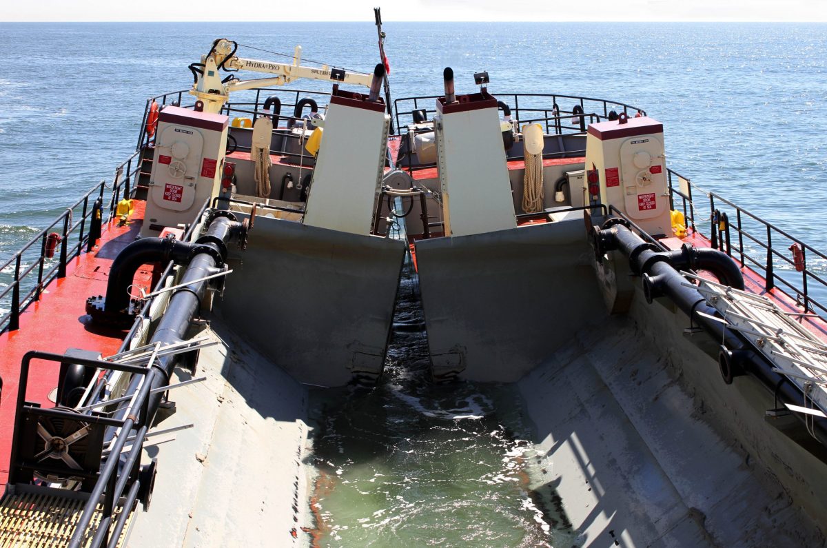 The Corps' Dredge Murden based out of Wilmington clears shoaling from Barnegat Inlet, N.J. in 2014. The hopper dredge serves shallow-draft navigation needs along the Atlantic and Gulf coasts. Photo: Corps