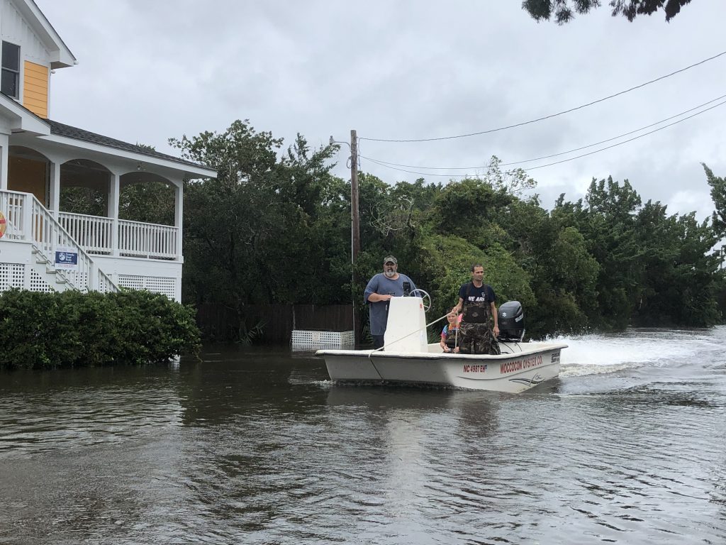 Dorian cuts off North Carolina community following its US landfall