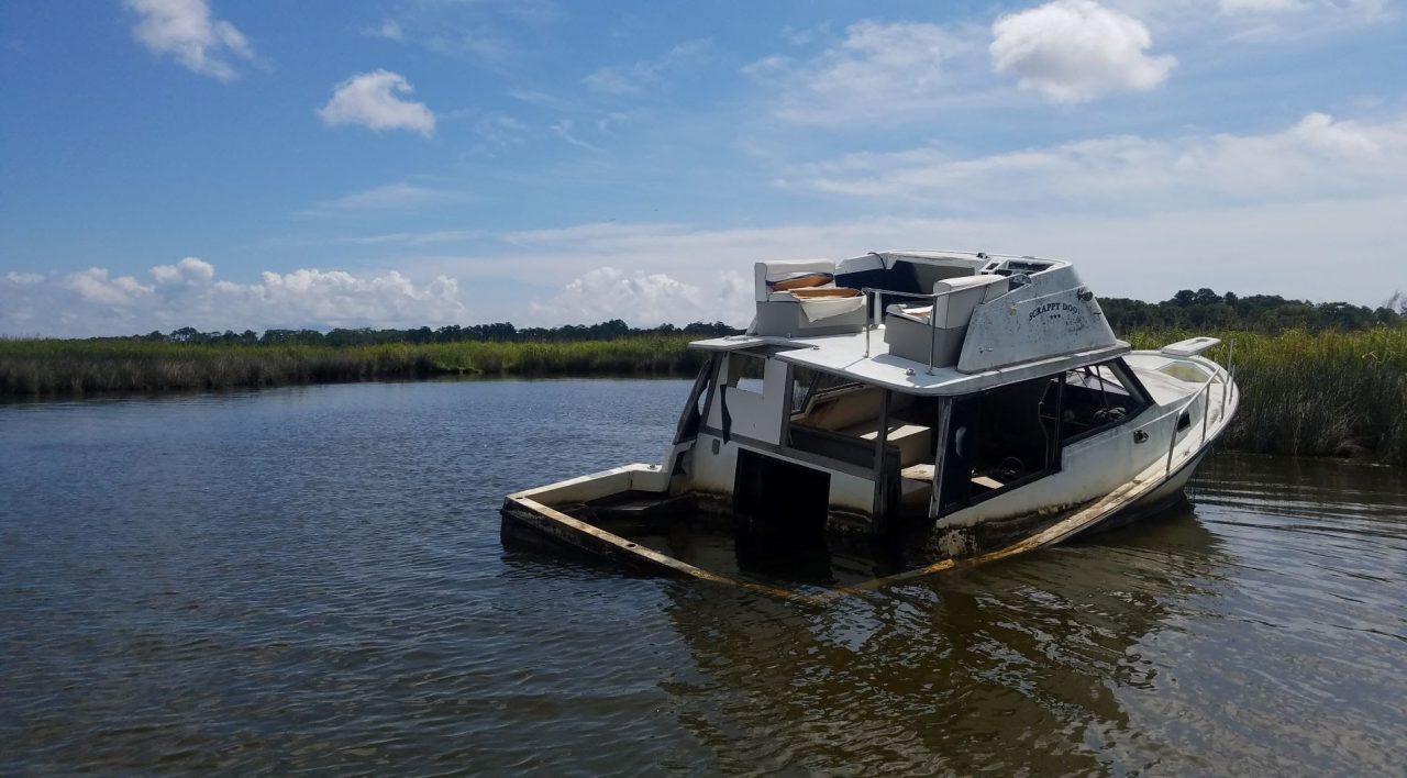 The Scrappy Doo, an abandoned and derelict vessel located near Baum Point Island within the Kitty Hawk Woods Reserve. Photo: North Carolina Coastal Federation