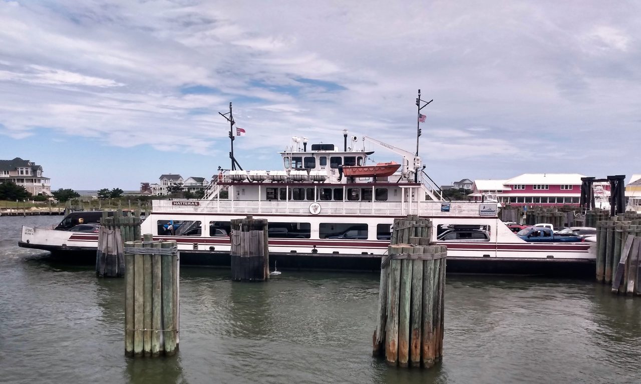 Vehicles and passengers board the Hatteras ferry in this file photo.