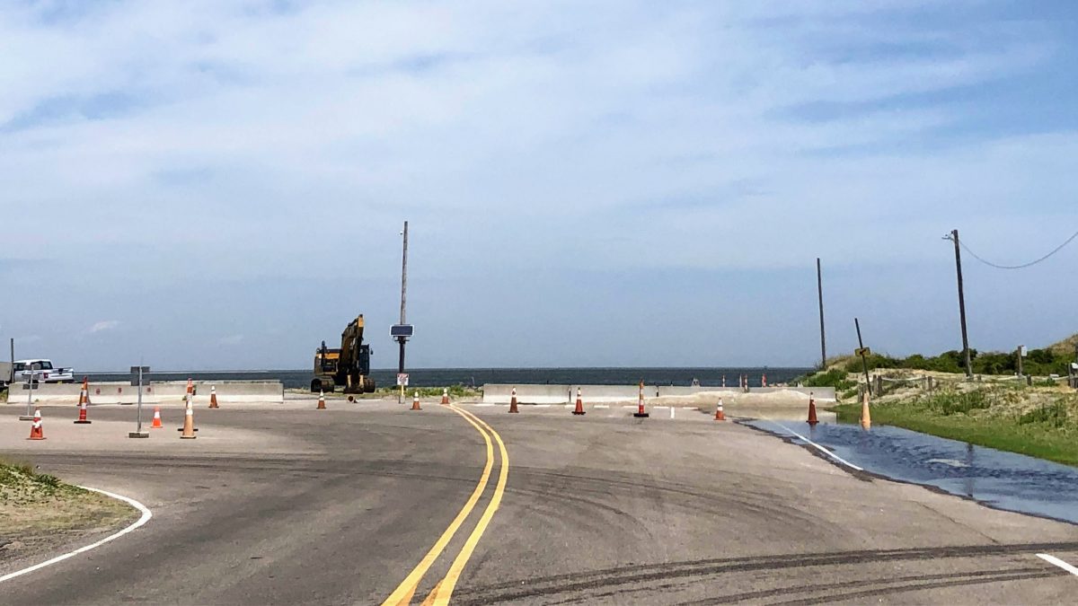 The stacking lanes at South Dock have been eroded so badly they can’t be used. Vehicles have to line up along N.C. 12. Photo: C. Leinbach