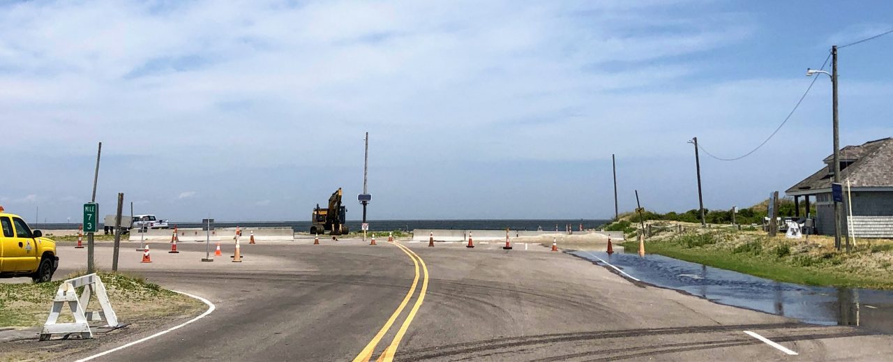 The stacking lanes at South Dock have been eroded so badly they can’t be used. Vehicles have to line up along N.C. 12. Photo: C. Leinbach