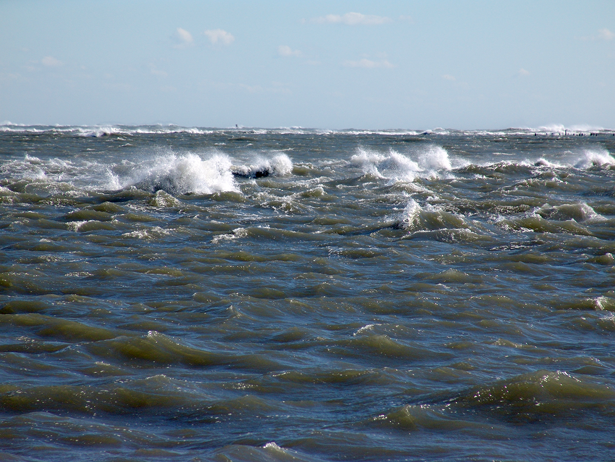 Waves crest over the shoals in Hatteras Inlet in this view from the ferry to Ocracoke. Photo: Vicki Harrison