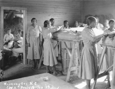 An Federal Emergency Relief Administration (FERA) pine straw mattress factory for unemployed women in Wilmington, N.C., ca. 1934. The FERA was a predecessor of the WPA. Courtesy, State Archives of North Carolina
