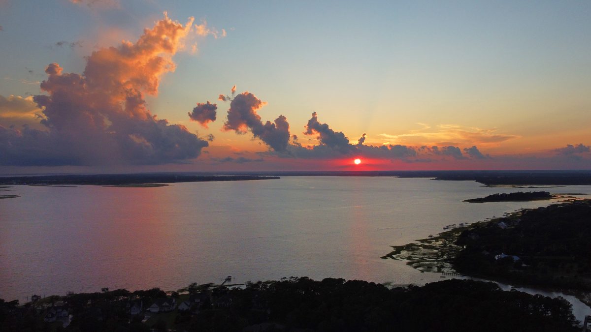 The sun sets over the Newport River in between Beaufort and Morehead City in Carteret County. Photo: Dylan Ray