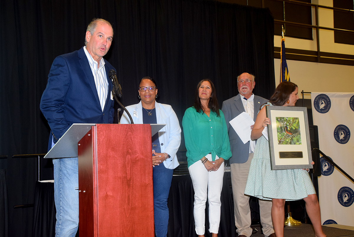 Beaufort Mayor Rett Newton speaks as the town is recognized with a Pelican Award for exceptional leadership for clean coastal waters. Photo: Mark Hibbs