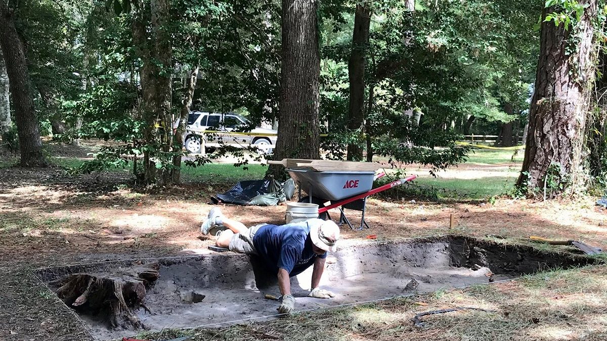 A volunteer works in an excavation pit at Fort Raleigh National Historic Site. Photo: Catherine Kozak