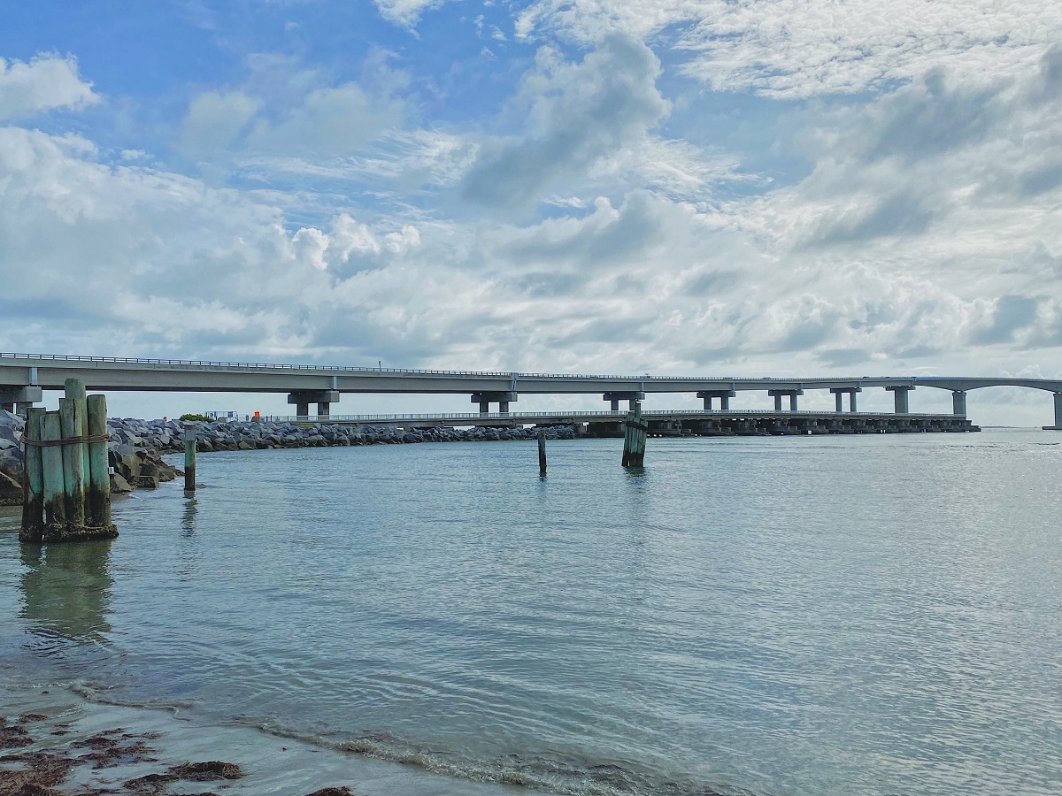 Bonner Bridge Pier in the foreground with the Basnight Bridge in the background. Photo: Cape Hatteras National Seashore