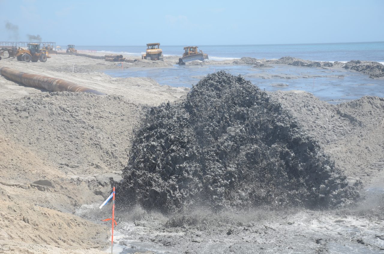 Sand is pumped onto Carolina Beach during a nourishment project in May 2013. Photo: Corps