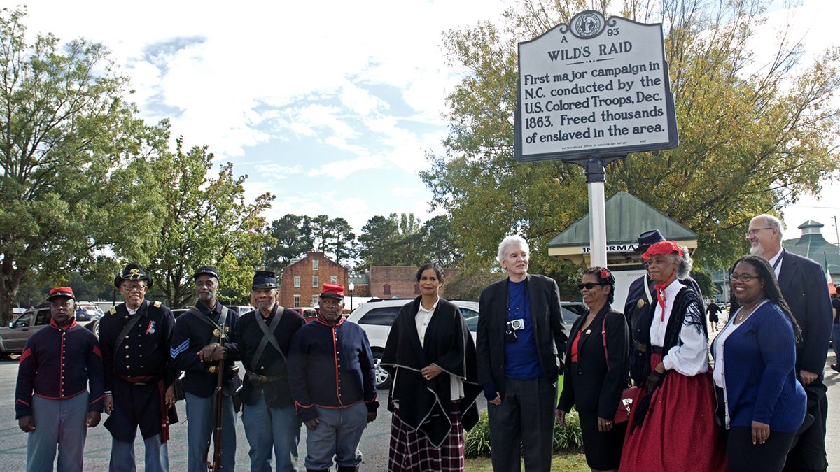 A state highway marker commemorating the first combat operations by African American troops from North Carolina in the state was unveiled Saturday at Elizabeth City’s Waterfront Park. Hundreds of enslaved North Carolinians were set free by Black soldiers during Gen. Edward Wild’s raid in December 1863. Photo: Kip Tabb