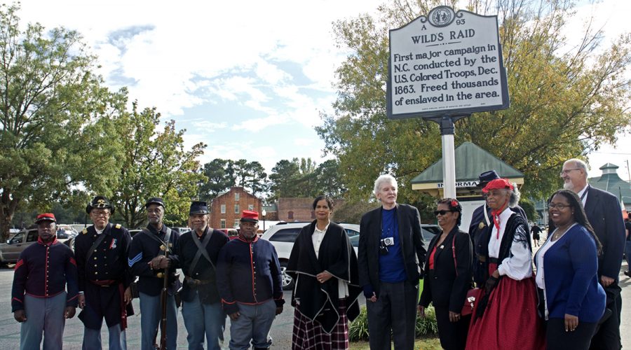 A state highway marker commemorating the first combat operations by African American troops from North Carolina in the state was unveiled Saturday at Elizabeth City’s Waterfront Park. Hundreds of enslaved North Carolinians were set free by Black soldiers during Gen. Edward Wild’s raid in December 1863. Photo: Kip Tabb