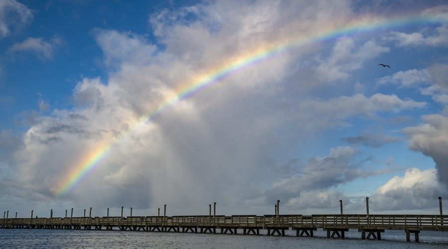 A rainbow commands the sky over the Newport River and the Radio Island Fishing Pier Wednesday in Carteret County. Photo: Dylan Ray