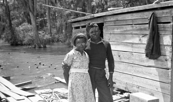 An enchanting young couple at the Terrapin Point shad and herring fishery in Bertie County, 1938-39. Photo: Charles A. Farrell, courtesy, State Archives of North Carolina 