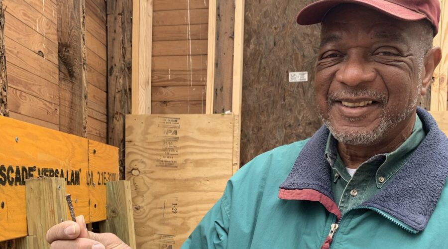 Al Beatty, president of the Cedar Hill/West Bank Heritage Foundation, holds an old nail pulled from a rotted area of wood framing Reaves Chapel. The chapel was built in the mid-1800s by former enslaved people on the Cedar Hill Plantation and other nearby plantations.