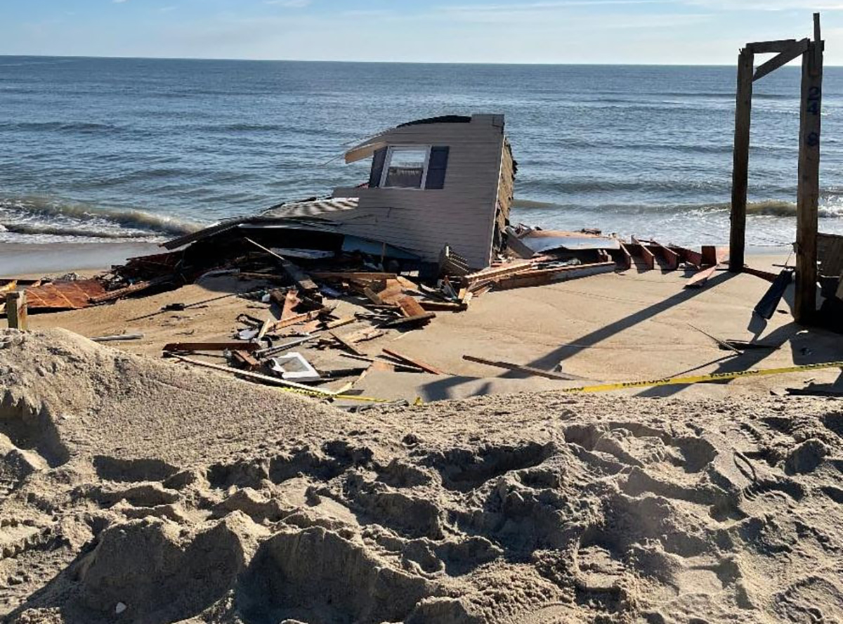 Remnants of collapsed house are shown on the beach Friday morning. National Park Service photo.
