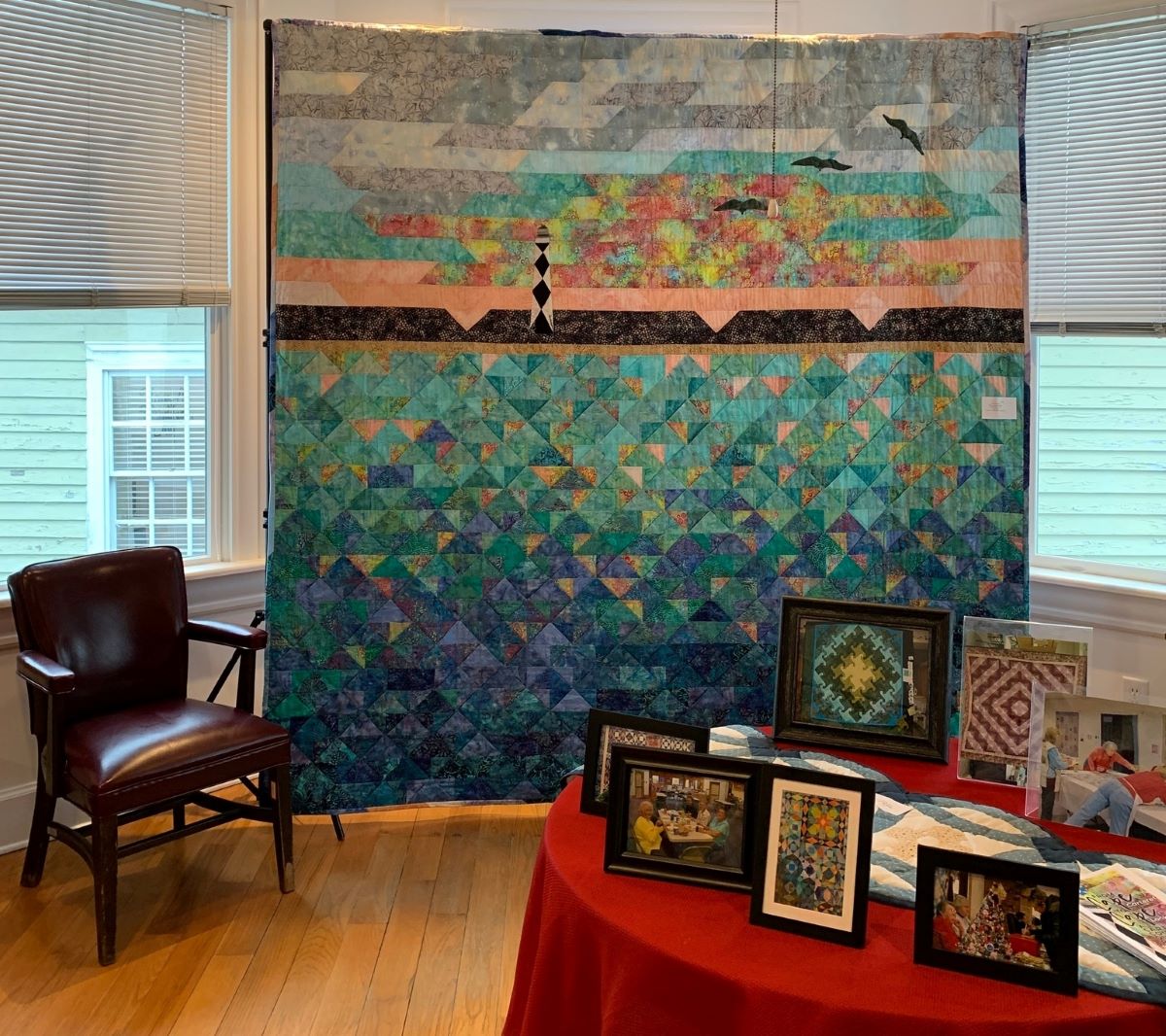 Handmade quilts, such as this one at the Core Sound Waterfowl Museum Store in downtown Morehead City, are part of a Carteret County-wide display recognizing National Quilting Month. Photo: Core Sound