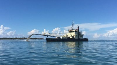 The side-caster dredge Merritt works in Hatteras Inlet. Photo: Donna Barnett/Island Free Press