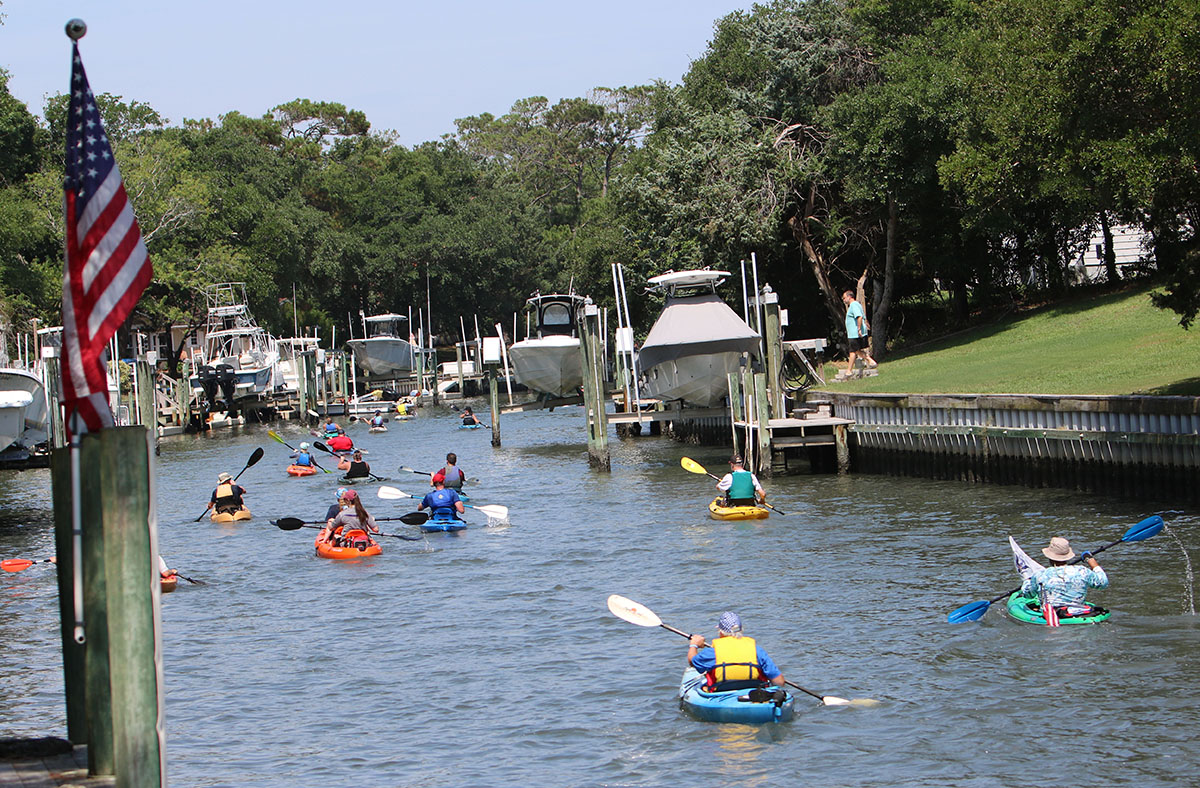 Kayakers are shown in the Pine Knoll Shores canal during a previous Kayak for the Warriors event. Photo: Contributed