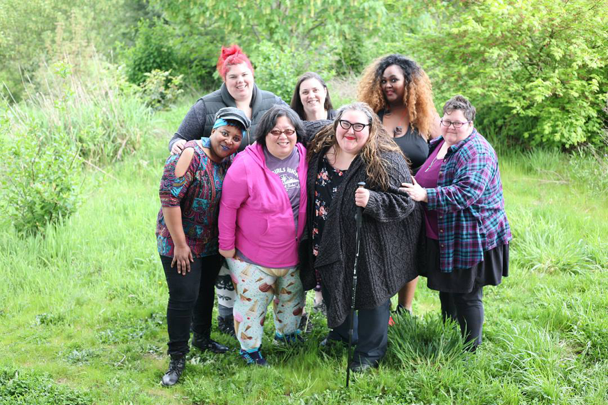 Members of the Fat Girls Hiking community pose in this 2018 photo from the group's Facebook page.