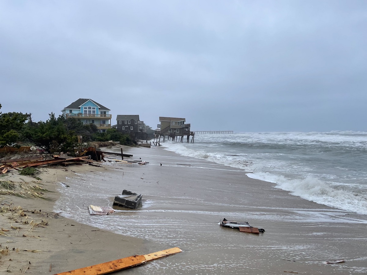 Debris is strewn along the beach south of the collapsed house site in Rodanthe Tuesday. Photo: National Park Service