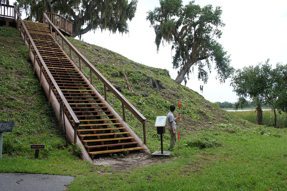 The Crystal River site in Florida with its massive shell mounds dominated by oysters is shown during archaeological mapping with a modern staircase and platform built on top of one of the mounds. Photo: Victor Thompson