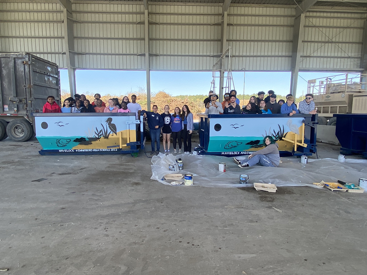 Students from Swansboro and Havelock high schools adorned dumpsters for oyster shell recycling with oyster-themed murals. Photo: North Carolina Coastal Federation