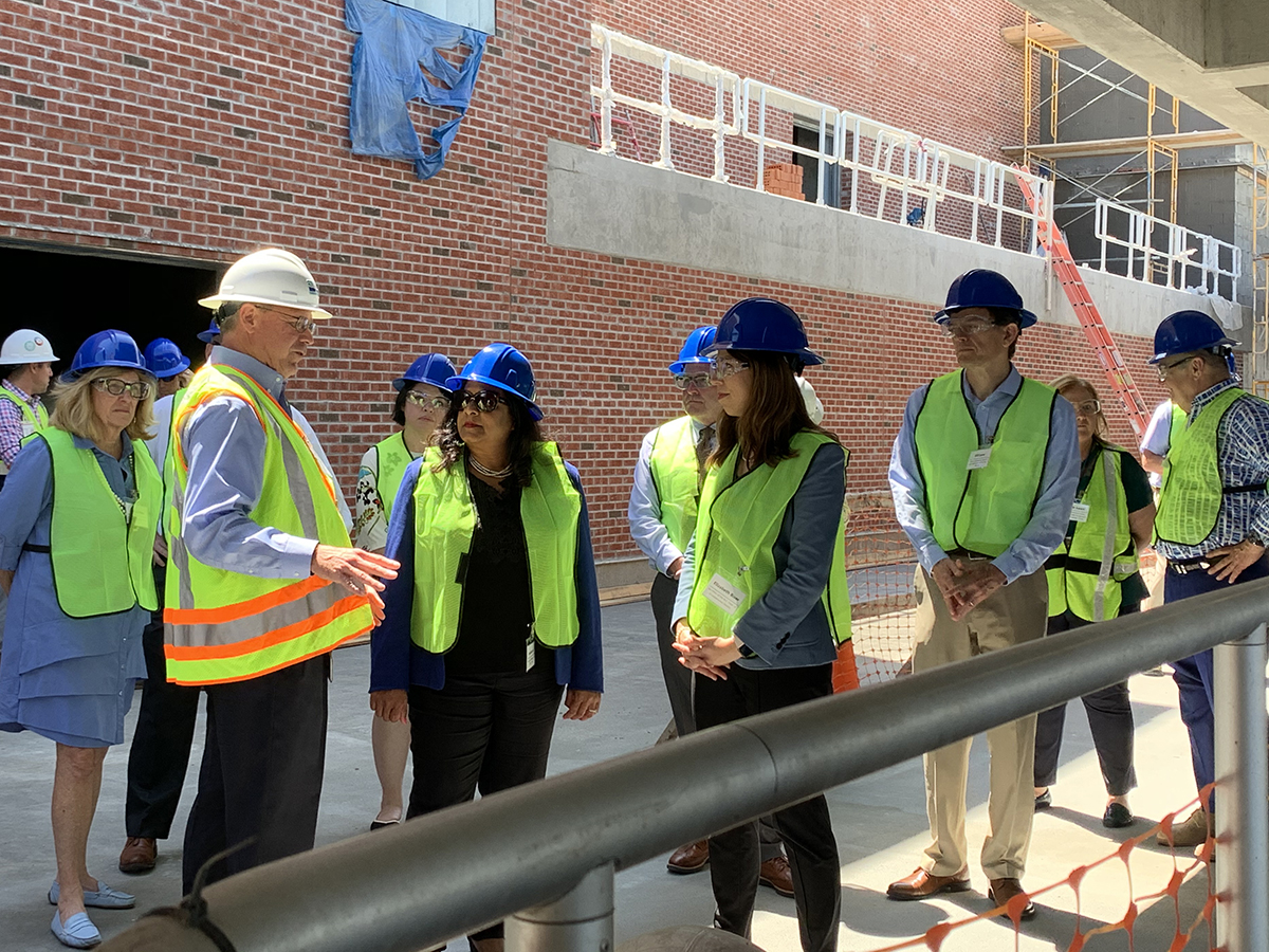 Carel Vandermeyden, left in the white hardhat, Cape Fear Public Utility Authority deputy executive director for treatment and engineering, leads a tour of the Cape Fear Public Utility Authority’s Sweeney Water Treatment Plant with EPA Assistant Administrator for Office of Water Radhika Fox and N.C. Department of Environmental Quality Secretary Elizabeth Biser. Photo: Trista Talton