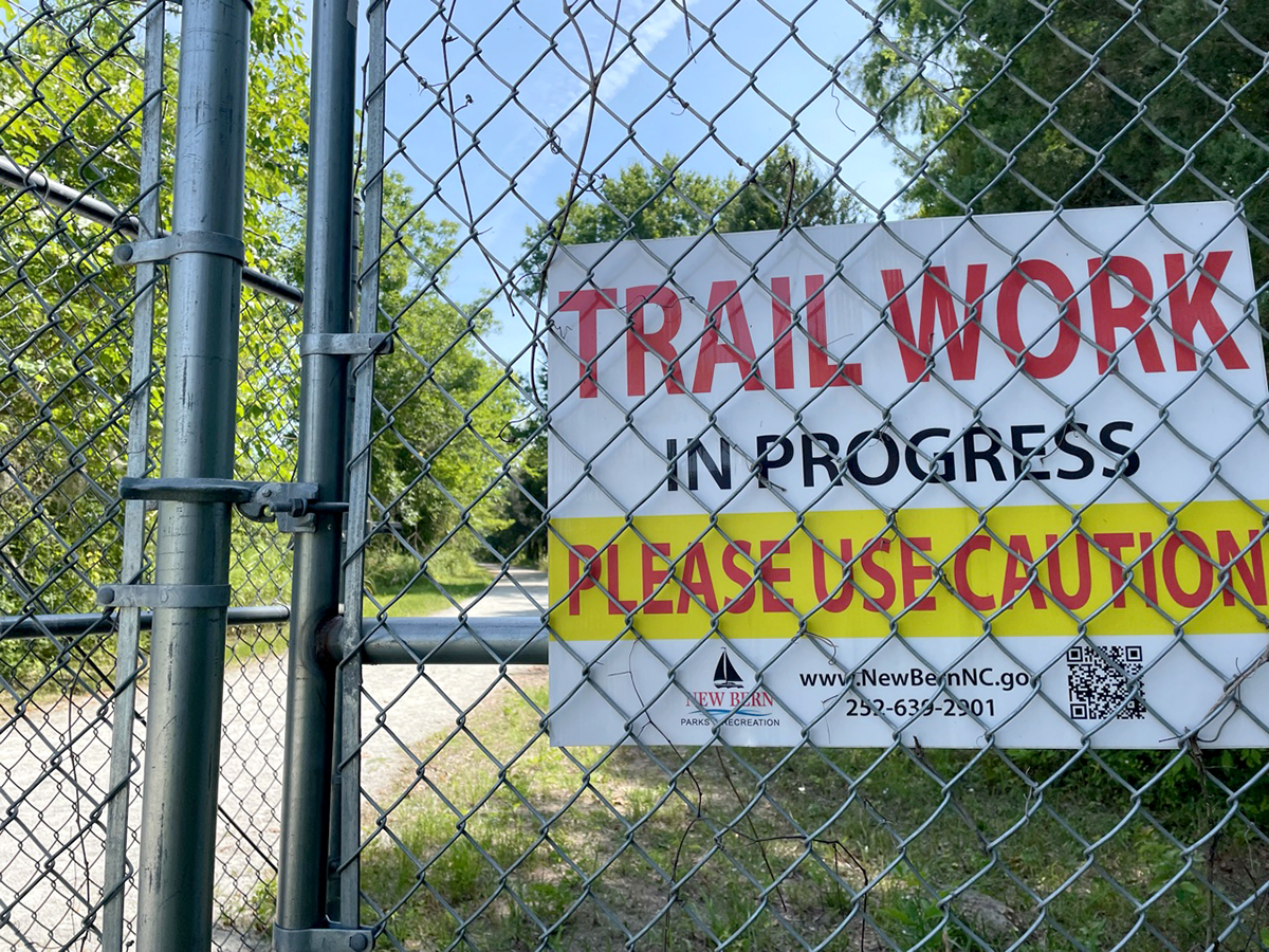 A sign advises caution at the entrance to Martin Marietta Park in New Bern. Photo: Jenna Seagle