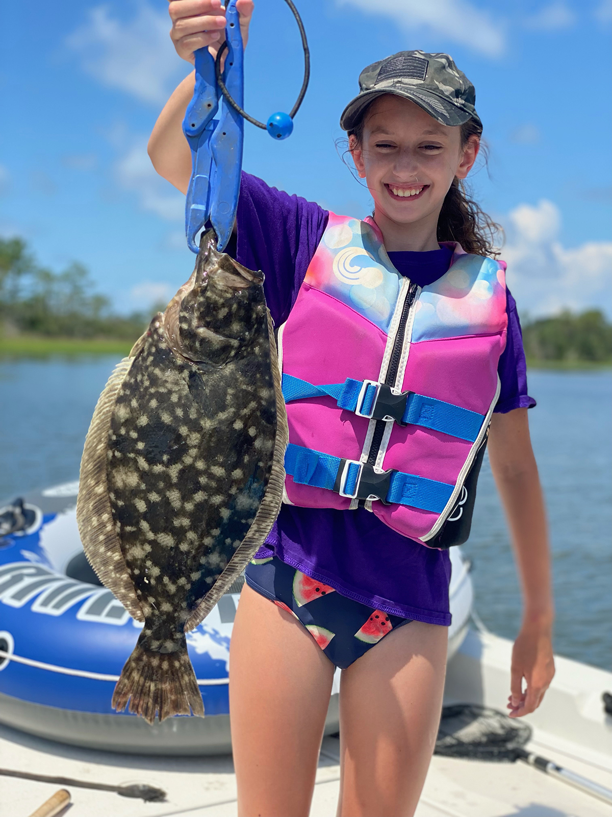 Katie Patterson of Newport shows off a nice flounder. Photo: Capt. Rick Patterson