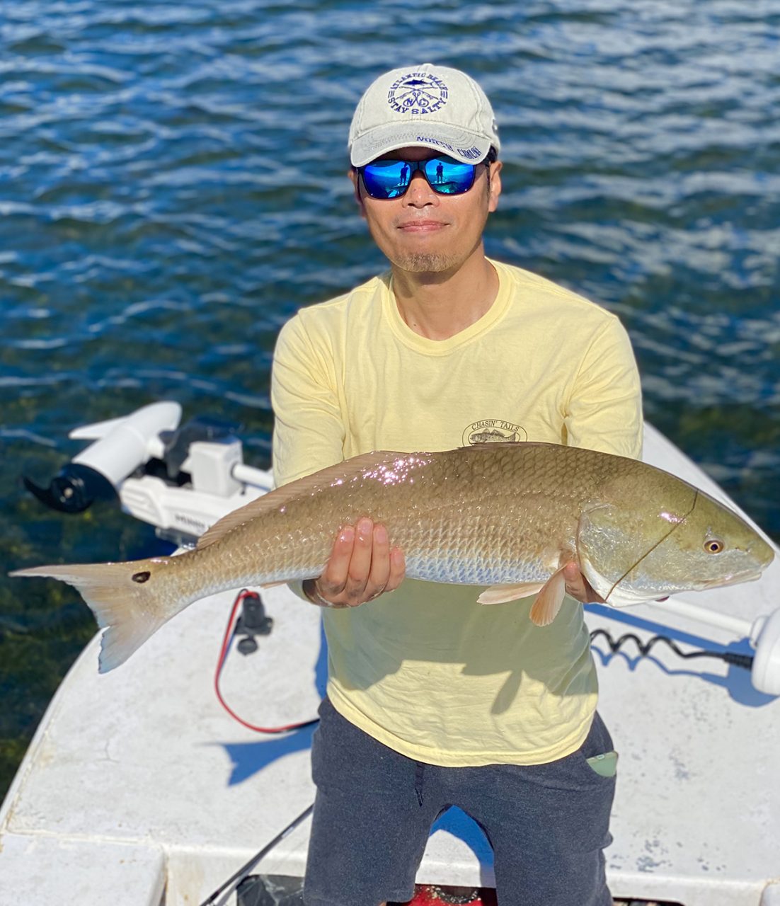 Shintaro Bunya of Morehead City saw a red spot on the surface that he knew was a school of cruising red drum.